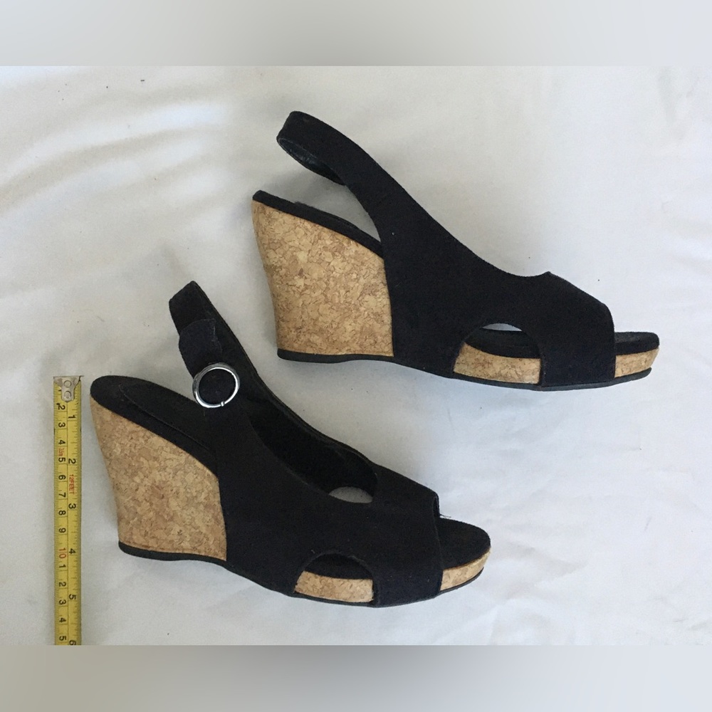 Sahara black suede platform cork wedges.